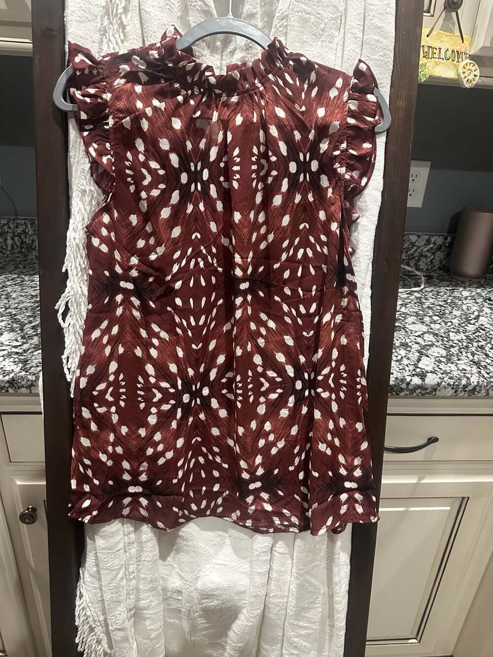 Mockneck Ruffle Sleeveless Blouse in Brown and White Print